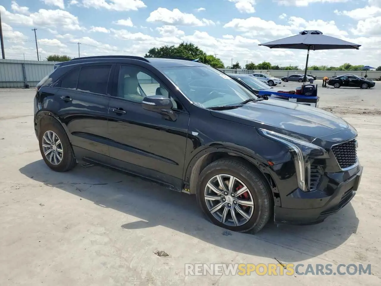 4 Photograph of a damaged car 1GYFZFR43MF054379 CADILLAC XT4 2021