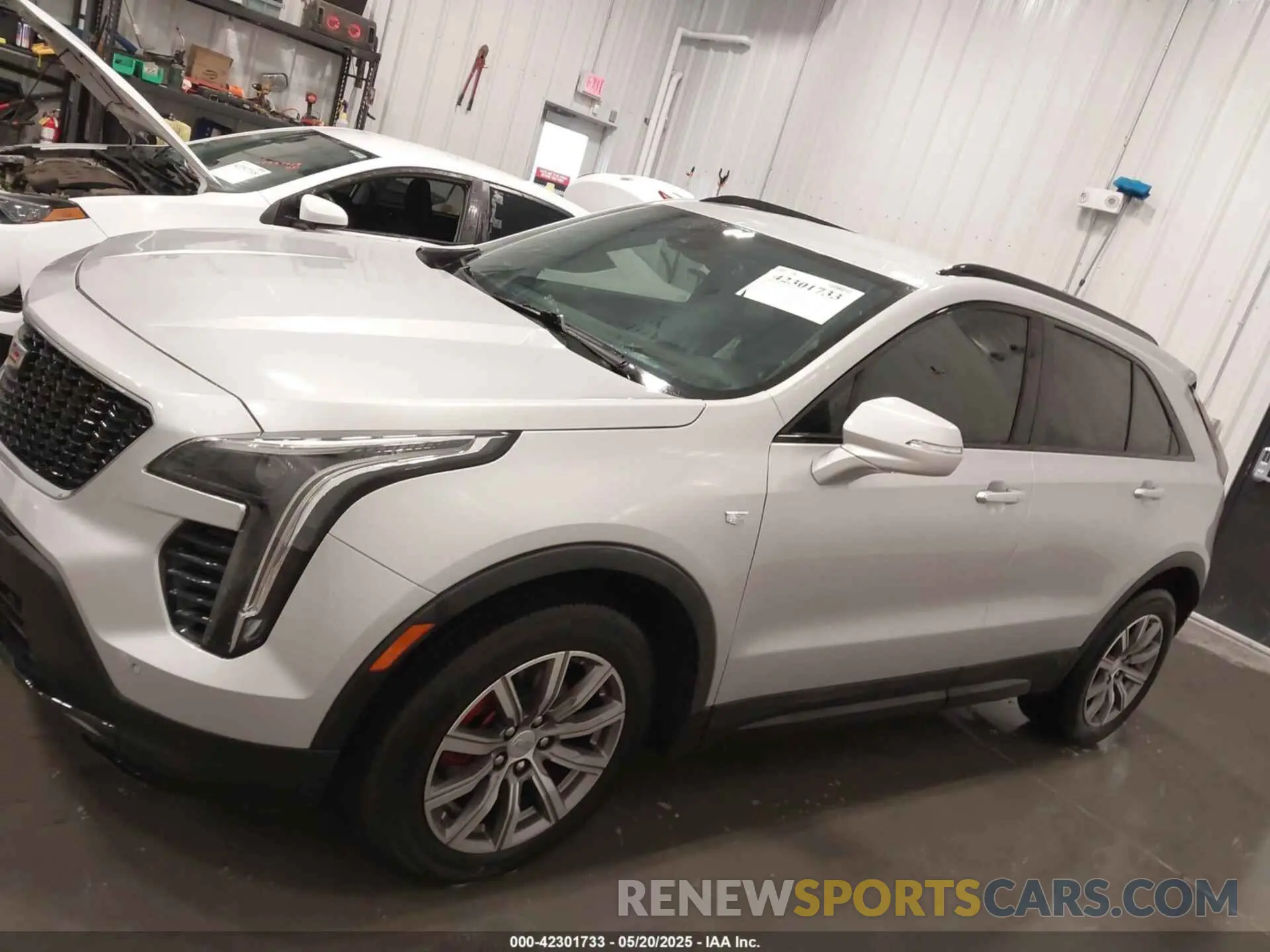 14 Photograph of a damaged car 1GYFZFR49MF013321 CADILLAC XT4 2021