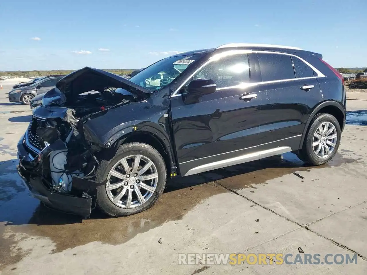 1 Photograph of a damaged car 1GYFZCR48NF105892 CADILLAC XT4 2022