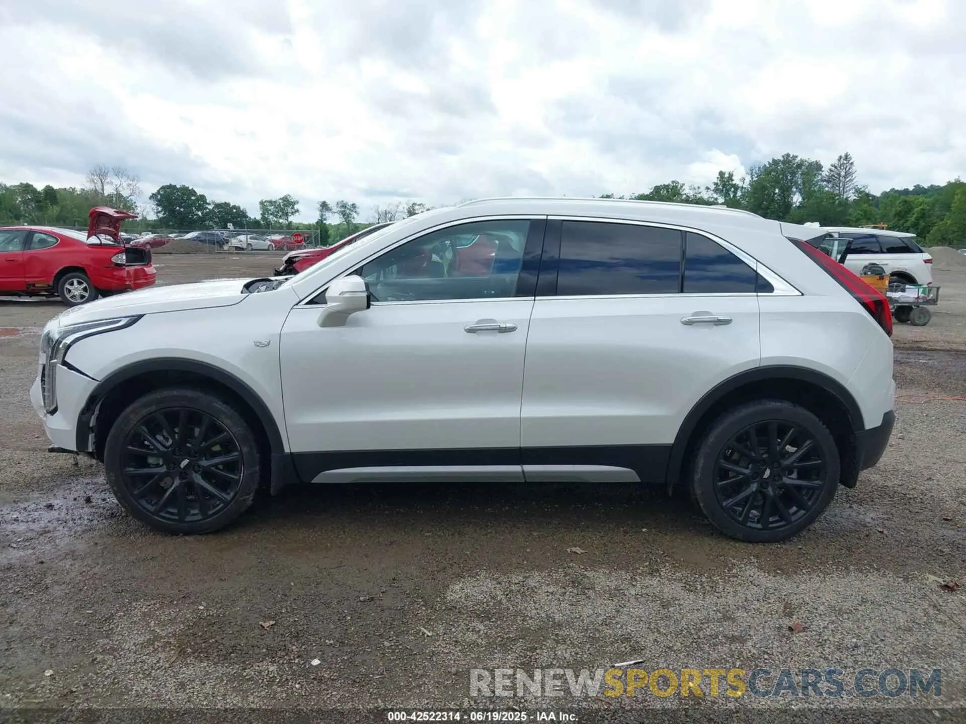 14 Photograph of a damaged car 1GYFZDR42NF128199 CADILLAC XT4 2022