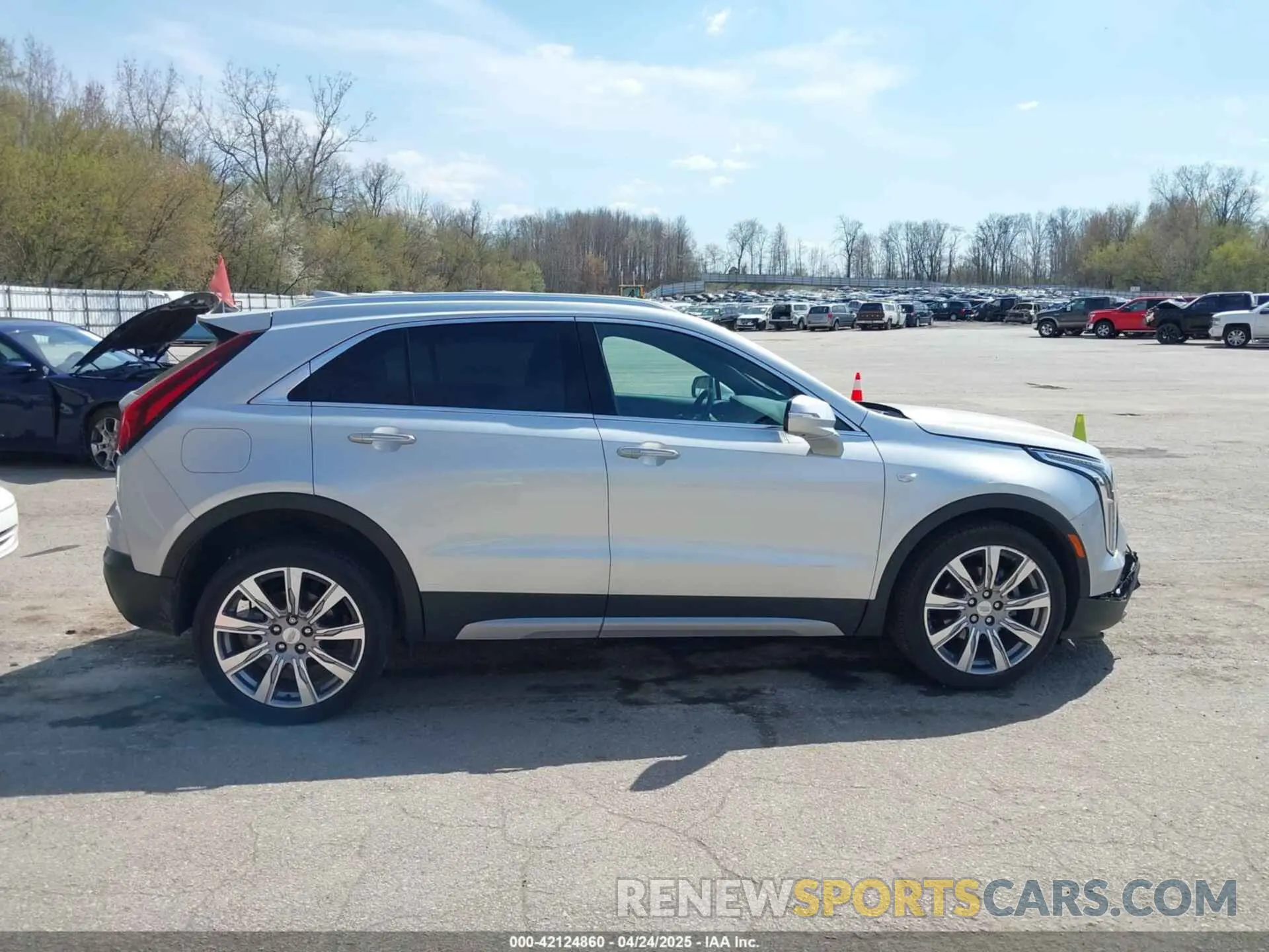 14 Photograph of a damaged car 1GYFZDR47NF157553 CADILLAC XT4 2022