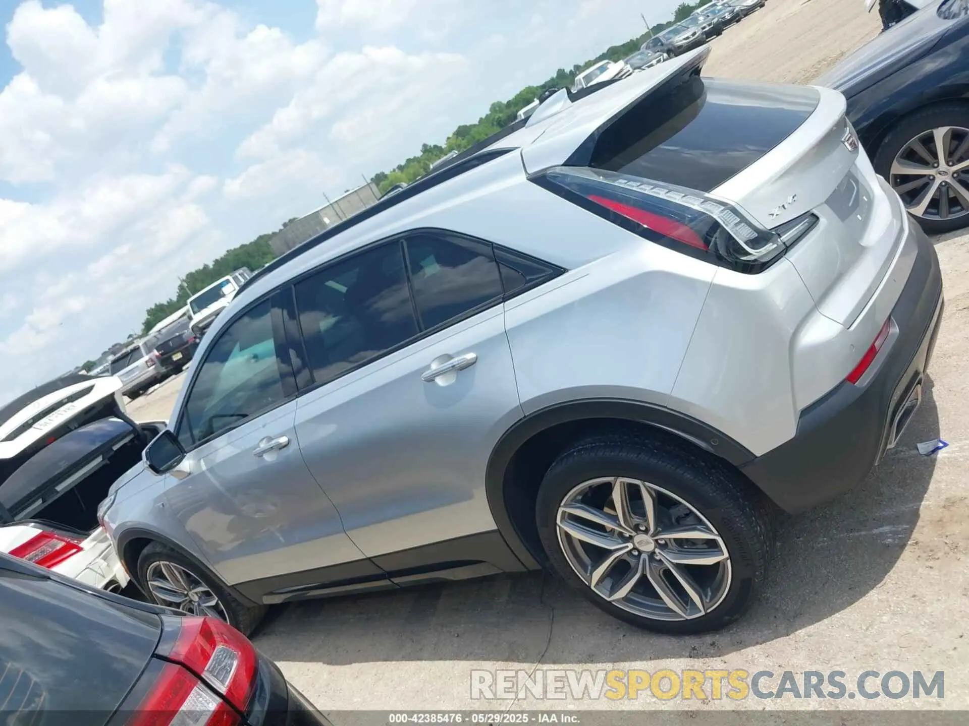 13 Photograph of a damaged car 1GYFZER43NF145874 CADILLAC XT4 2022
