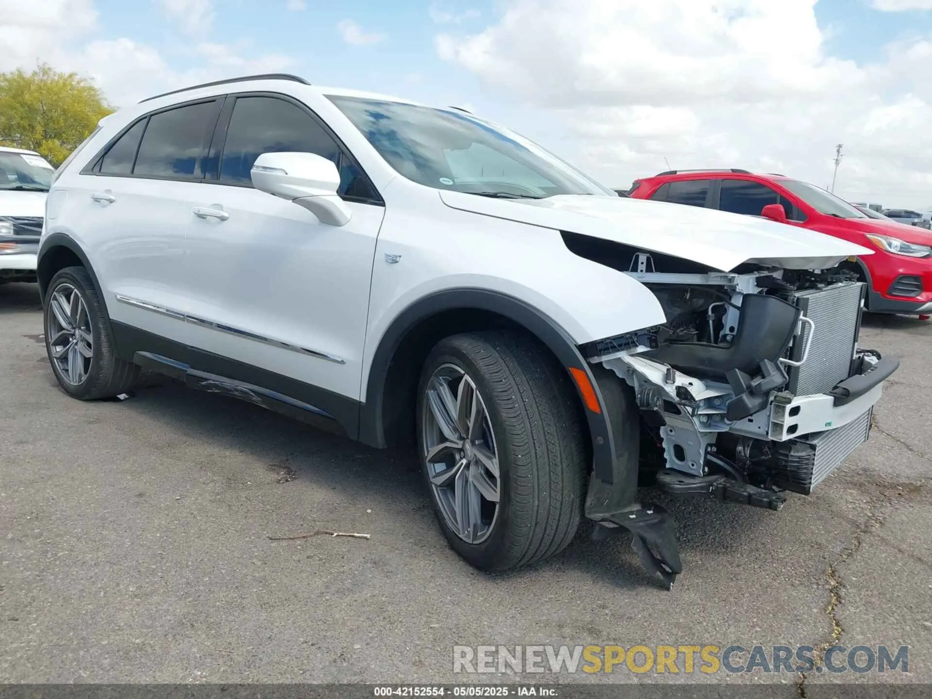1 Photograph of a damaged car 1GYFZER44NF164899 CADILLAC XT4 2022