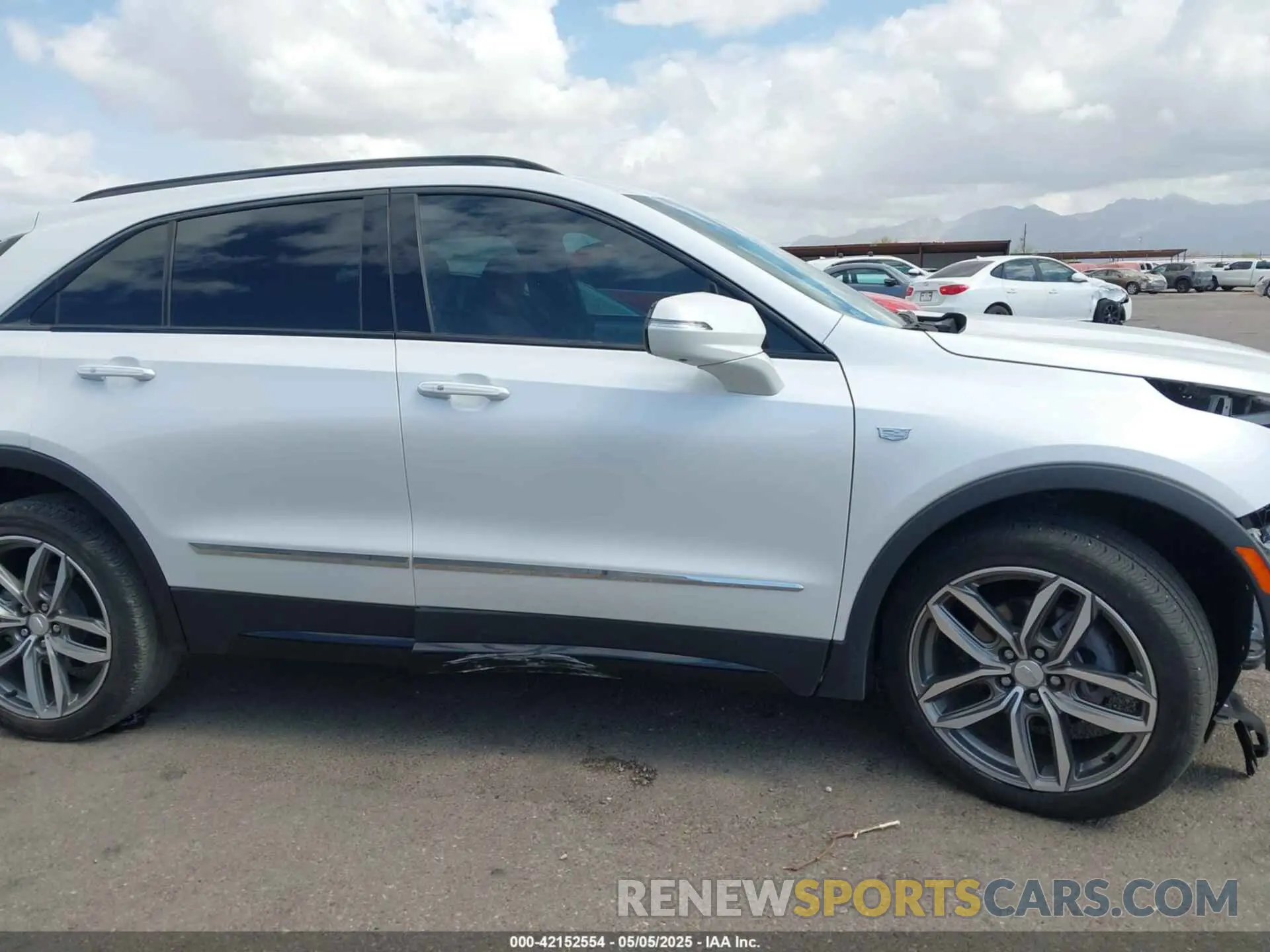 14 Photograph of a damaged car 1GYFZER44NF164899 CADILLAC XT4 2022