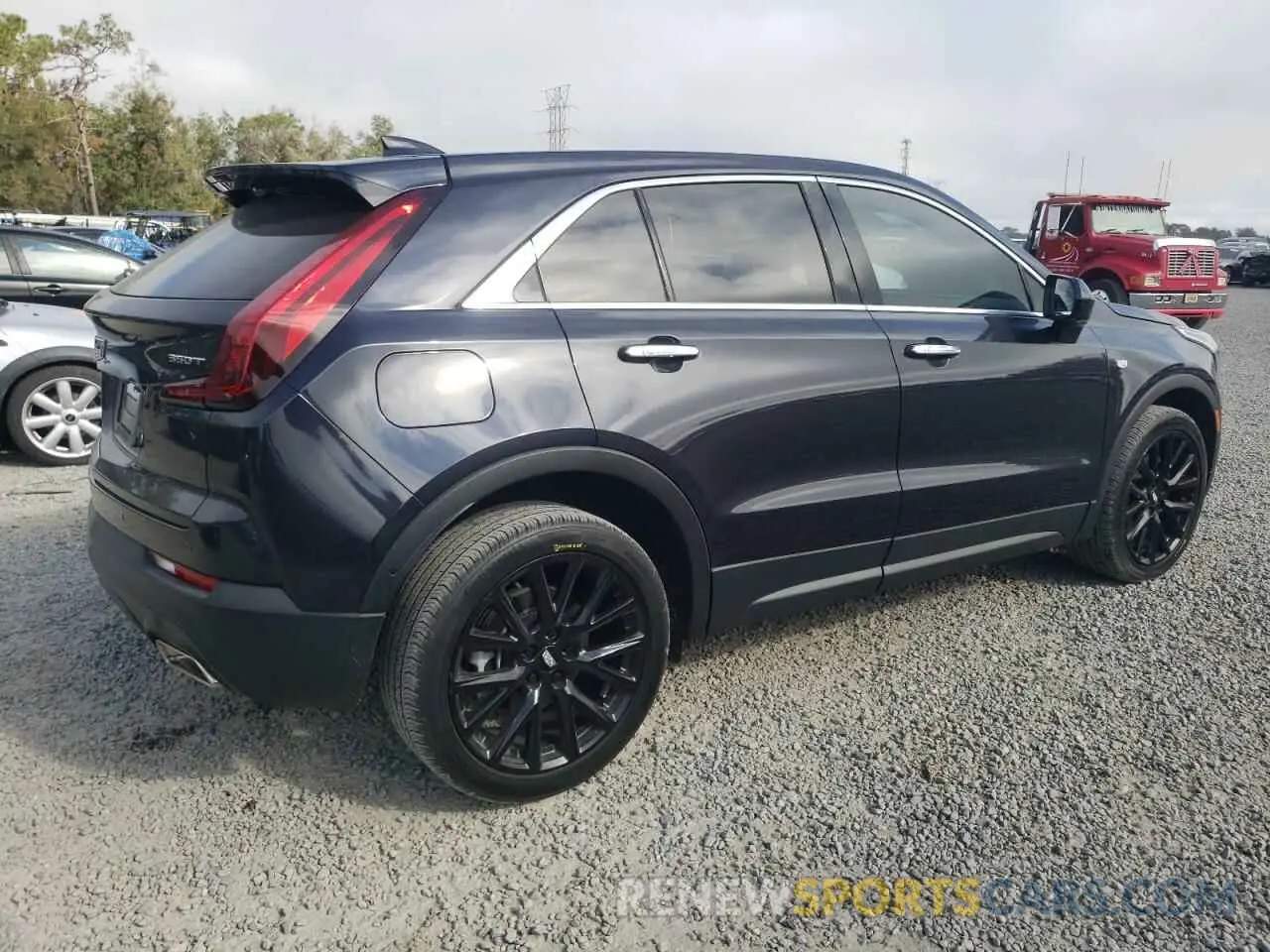 3 Photograph of a damaged car 1GYAZAR40PF101482 CADILLAC XT4 2023