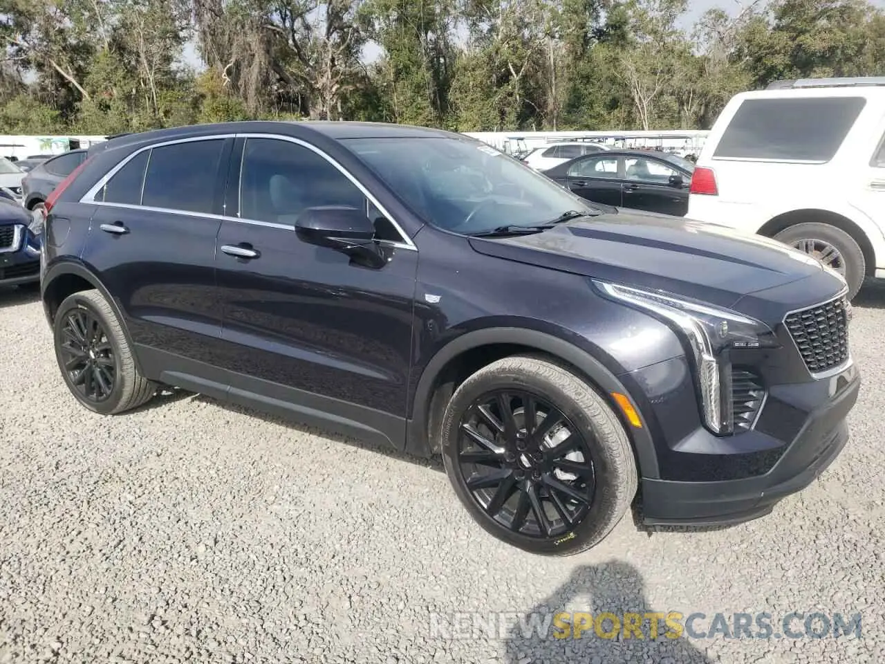 4 Photograph of a damaged car 1GYAZAR40PF101482 CADILLAC XT4 2023