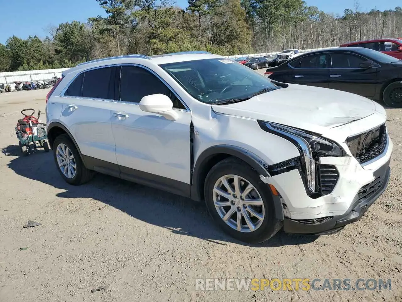 4 Photograph of a damaged car 1GYAZAR43PF122536 CADILLAC XT4 2023