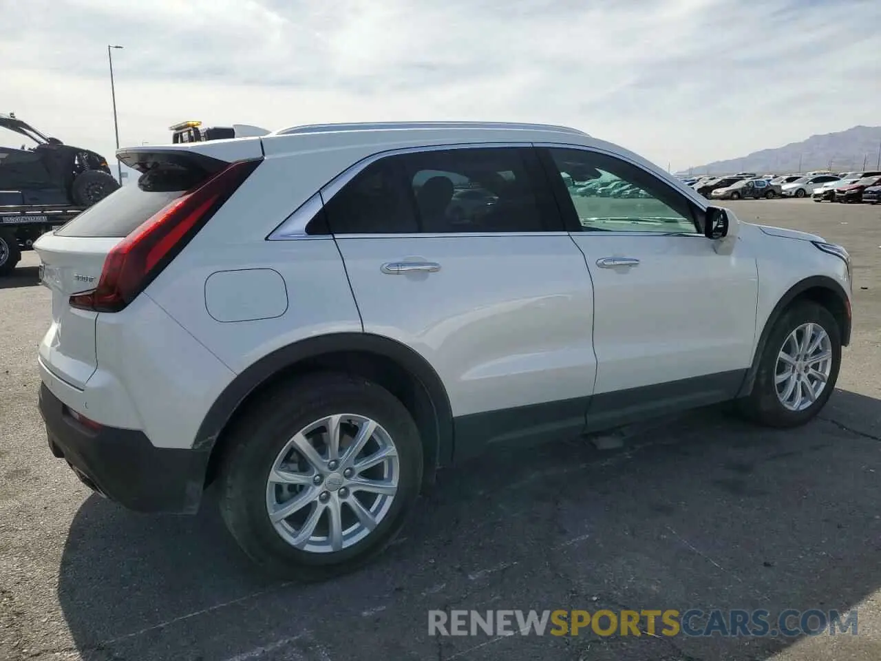 3 Photograph of a damaged car 1GYAZAR46PF134602 CADILLAC XT4 2023