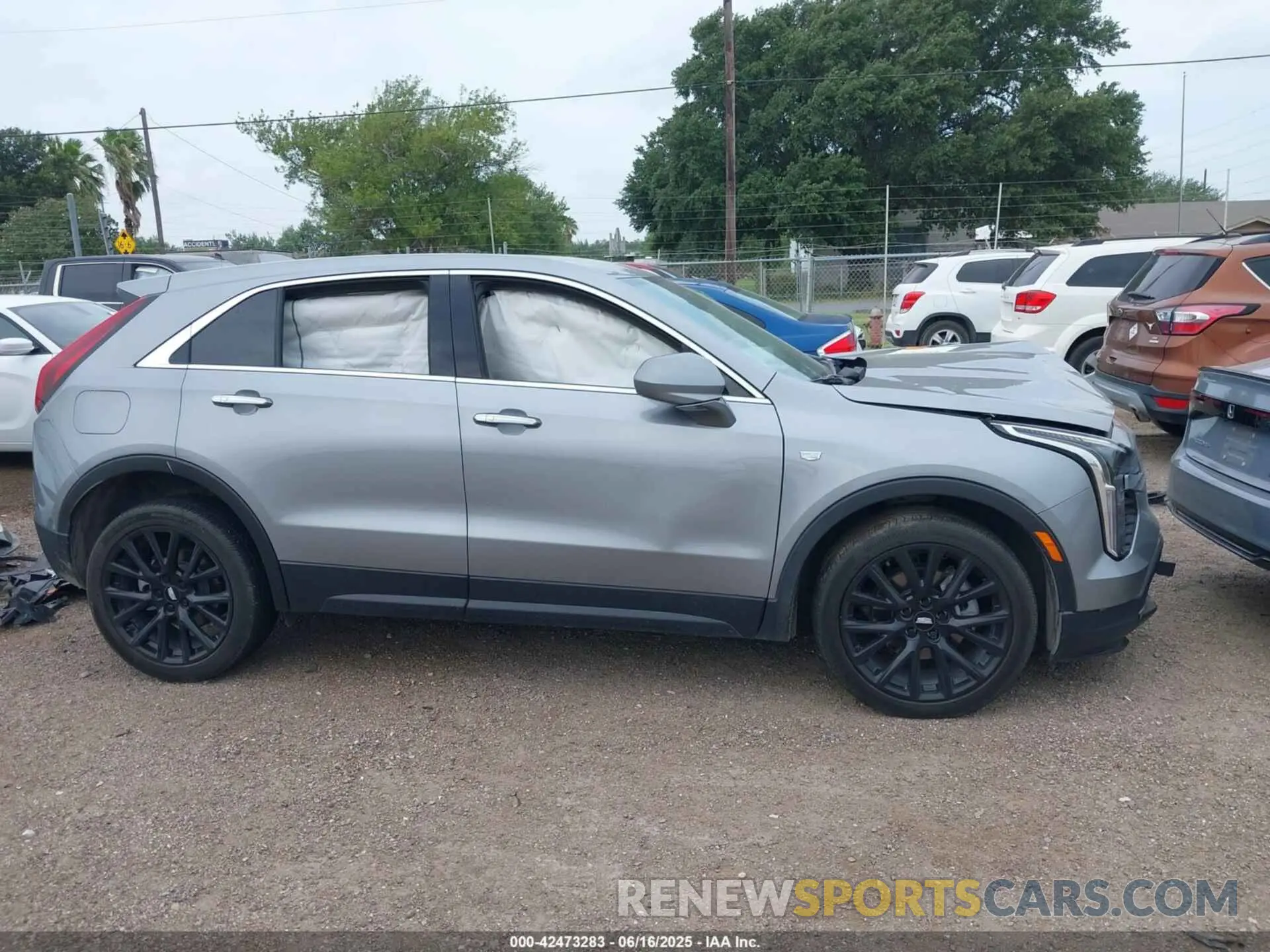 13 Photograph of a damaged car 1GYAZAR47PF134530 CADILLAC XT4 2023