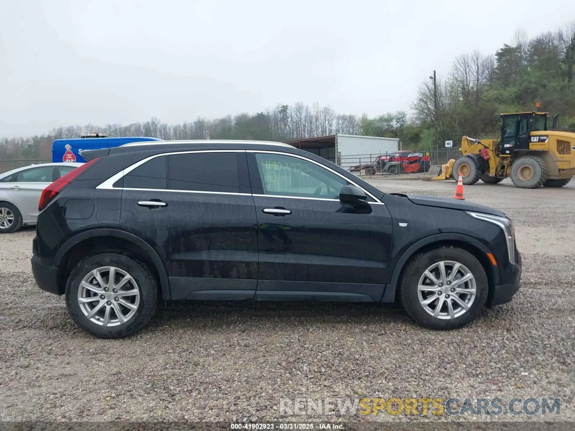 14 Photograph of a damaged car 1GYFZBR42PF103973 CADILLAC XT4 2023