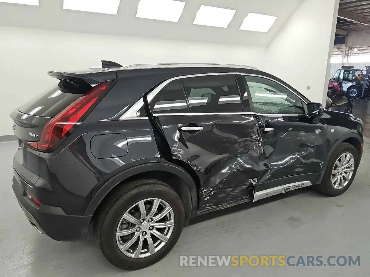 3 Photograph of a damaged car 1GYFZDR42PF174473 CADILLAC XT4 2023