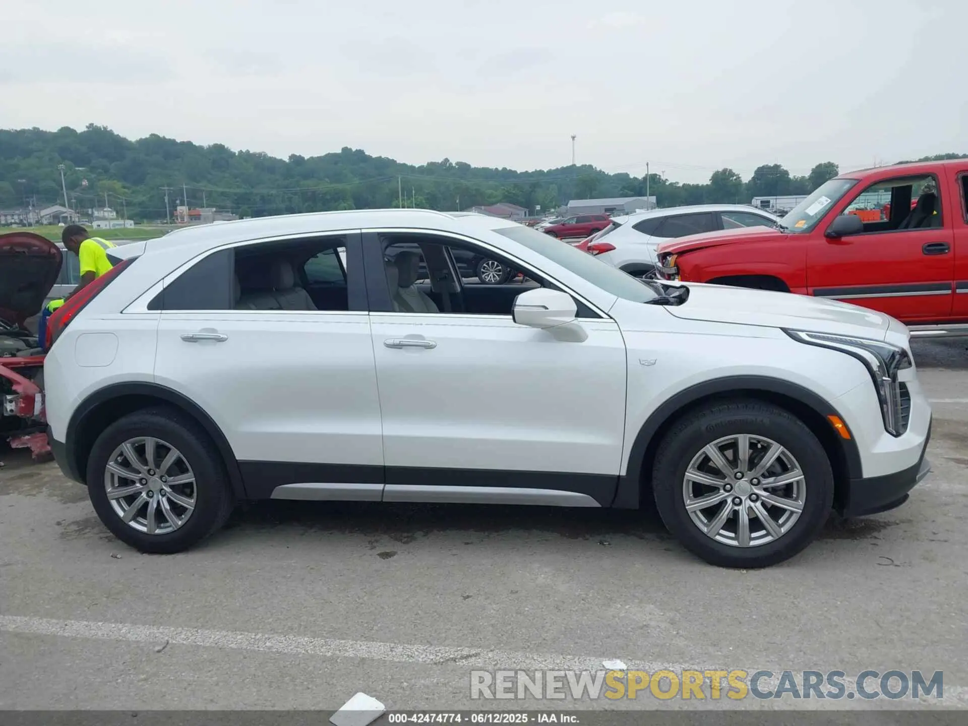12 Photograph of a damaged car 1GYFZDR43PF176779 CADILLAC XT4 2023