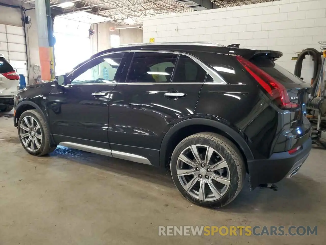 2 Photograph of a damaged car 1GYFZDR46PF112509 CADILLAC XT4 2023