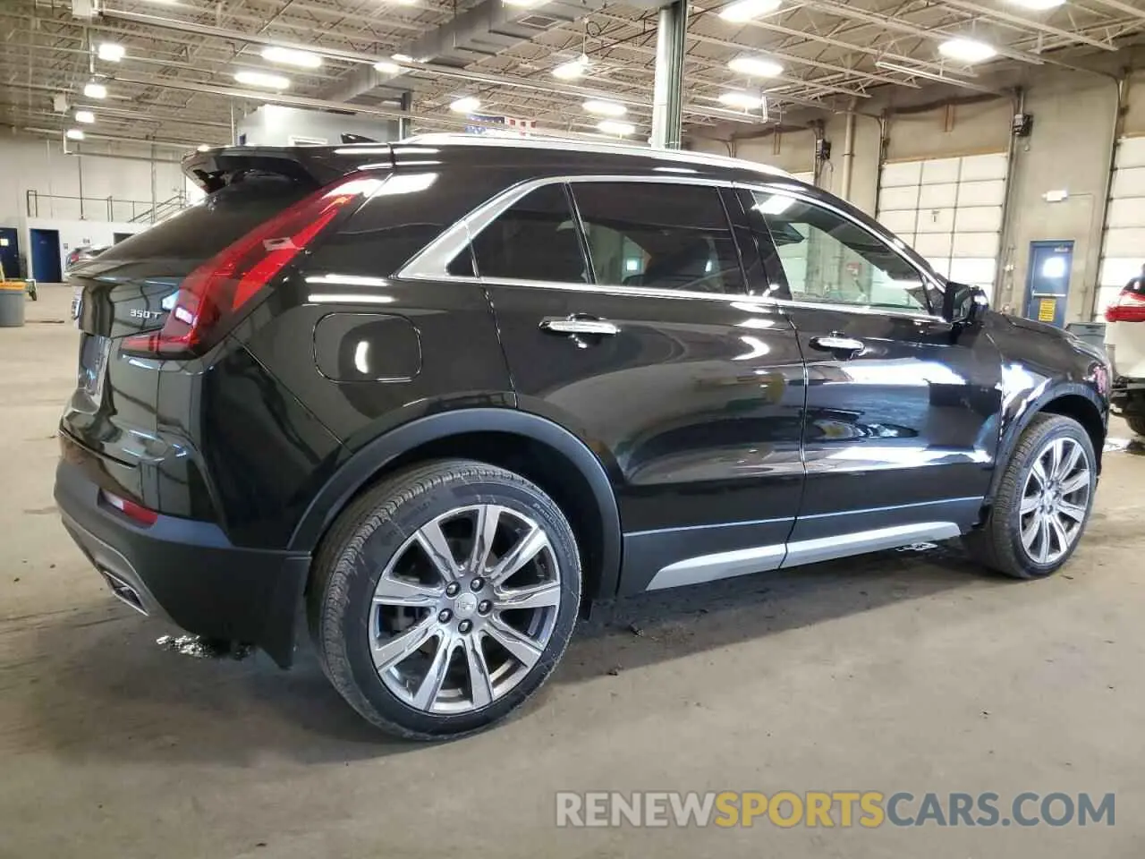 3 Photograph of a damaged car 1GYFZDR46PF112509 CADILLAC XT4 2023
