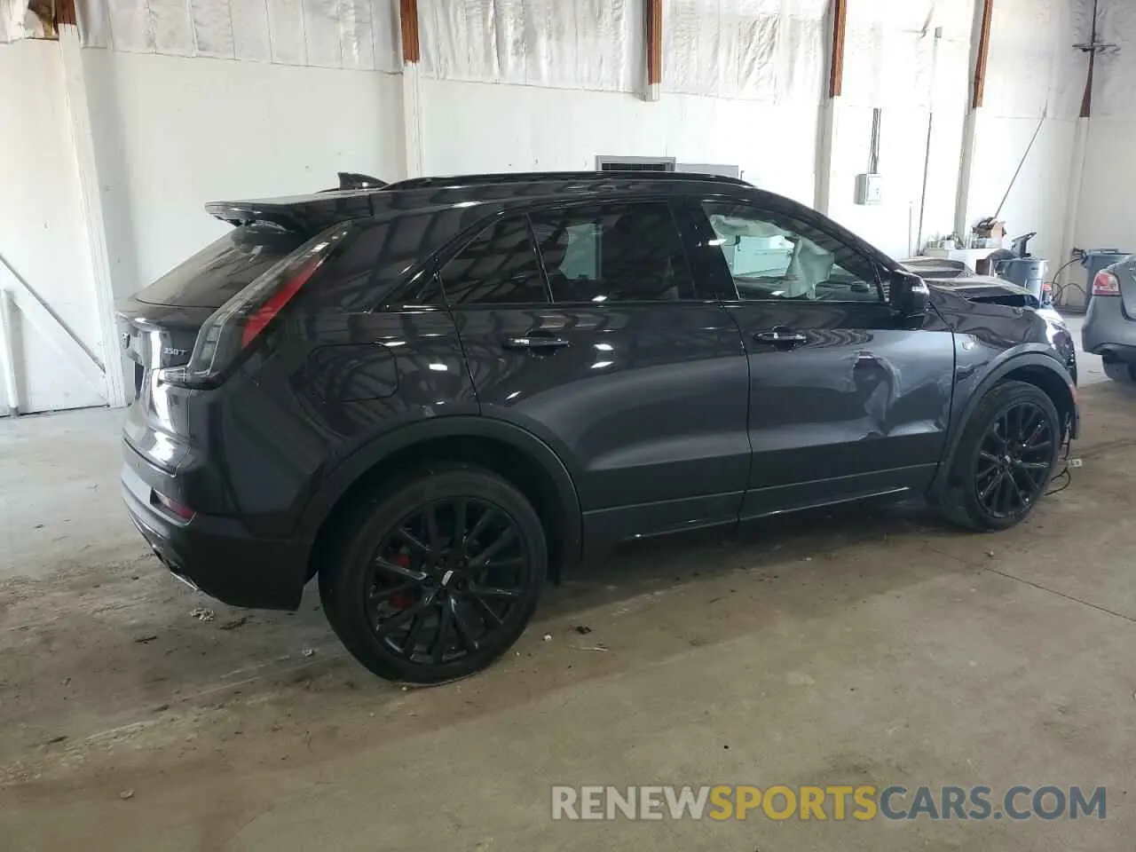 3 Photograph of a damaged car 1GYFZFR41PF103650 CADILLAC XT4 2023