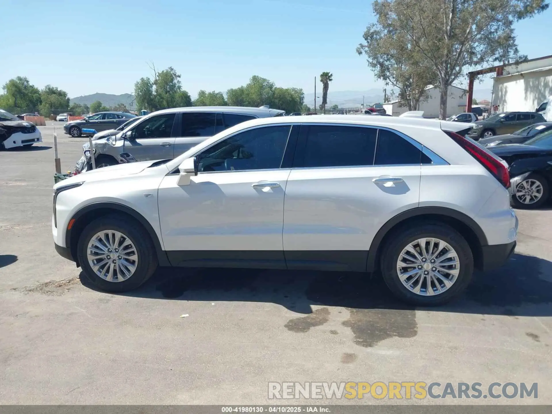 14 Photograph of a damaged car 1GYAZAR42RF168331 CADILLAC XT4 2024