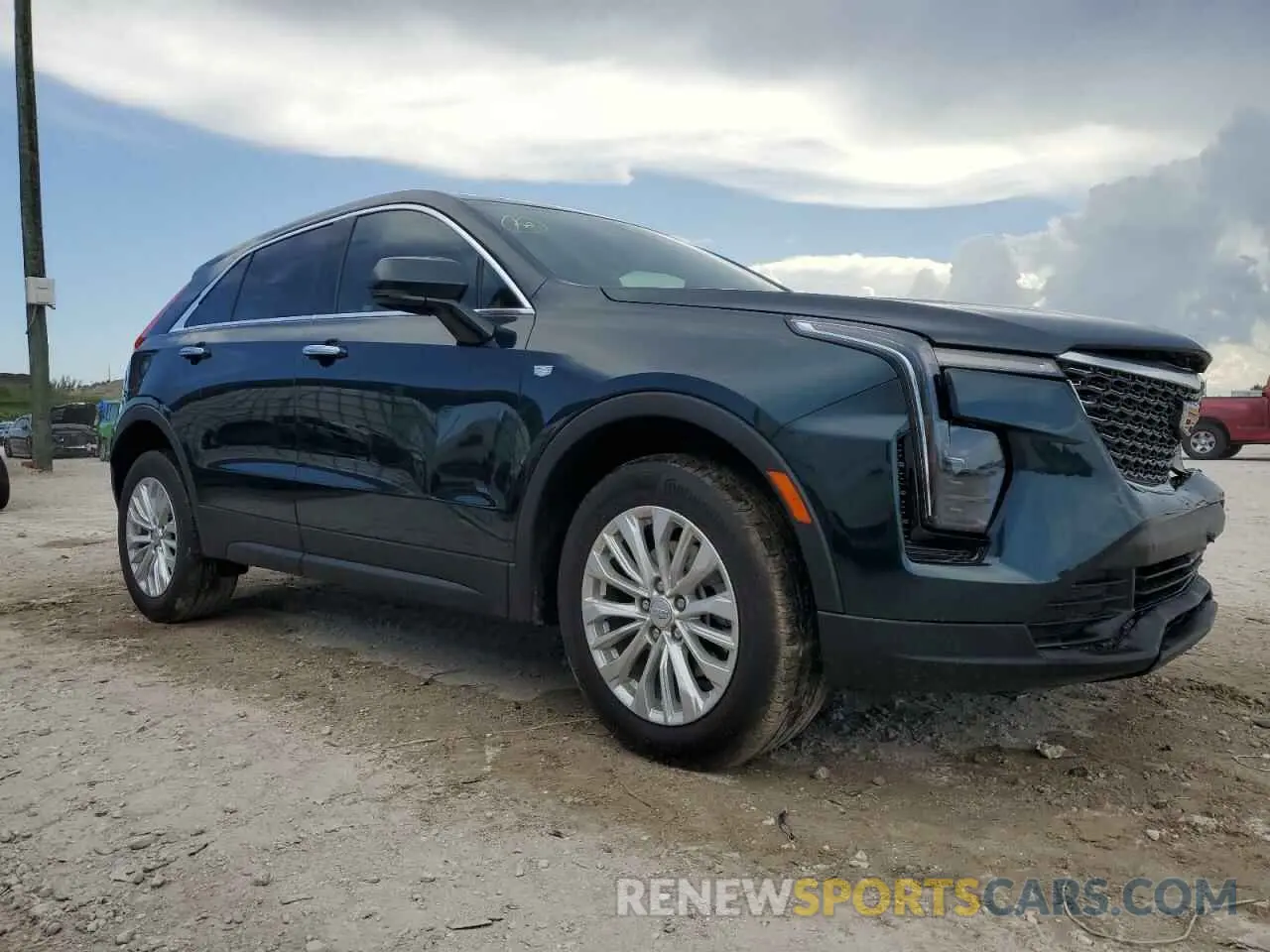 4 Photograph of a damaged car 1GYAZAR48RF136712 CADILLAC XT4 2024