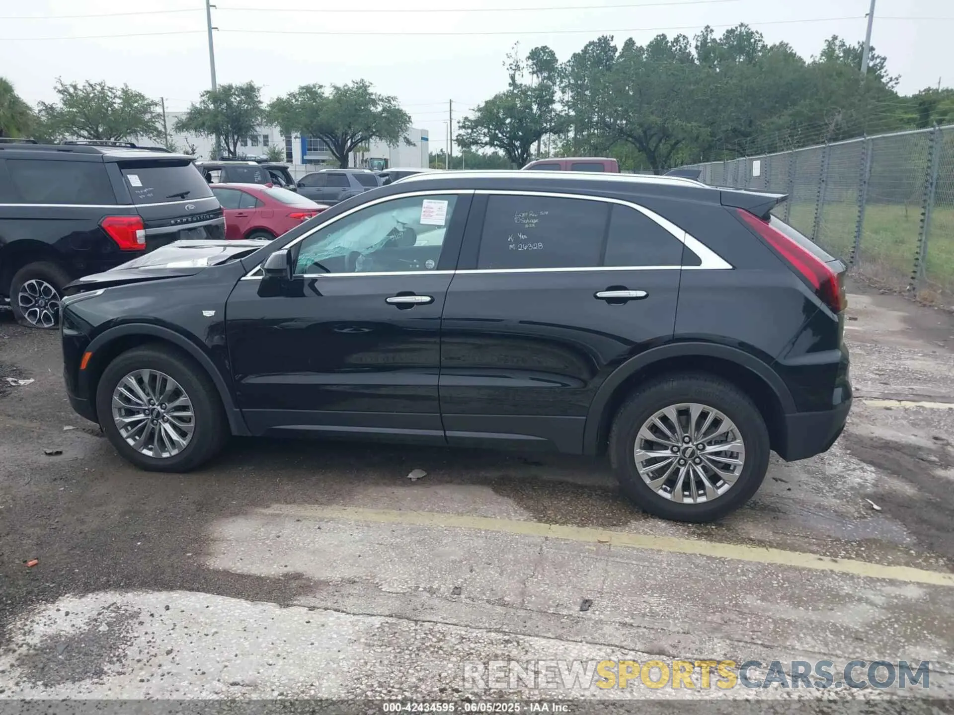 14 Photograph of a damaged car 1GYFZDR44RF147956 CADILLAC XT4 2024