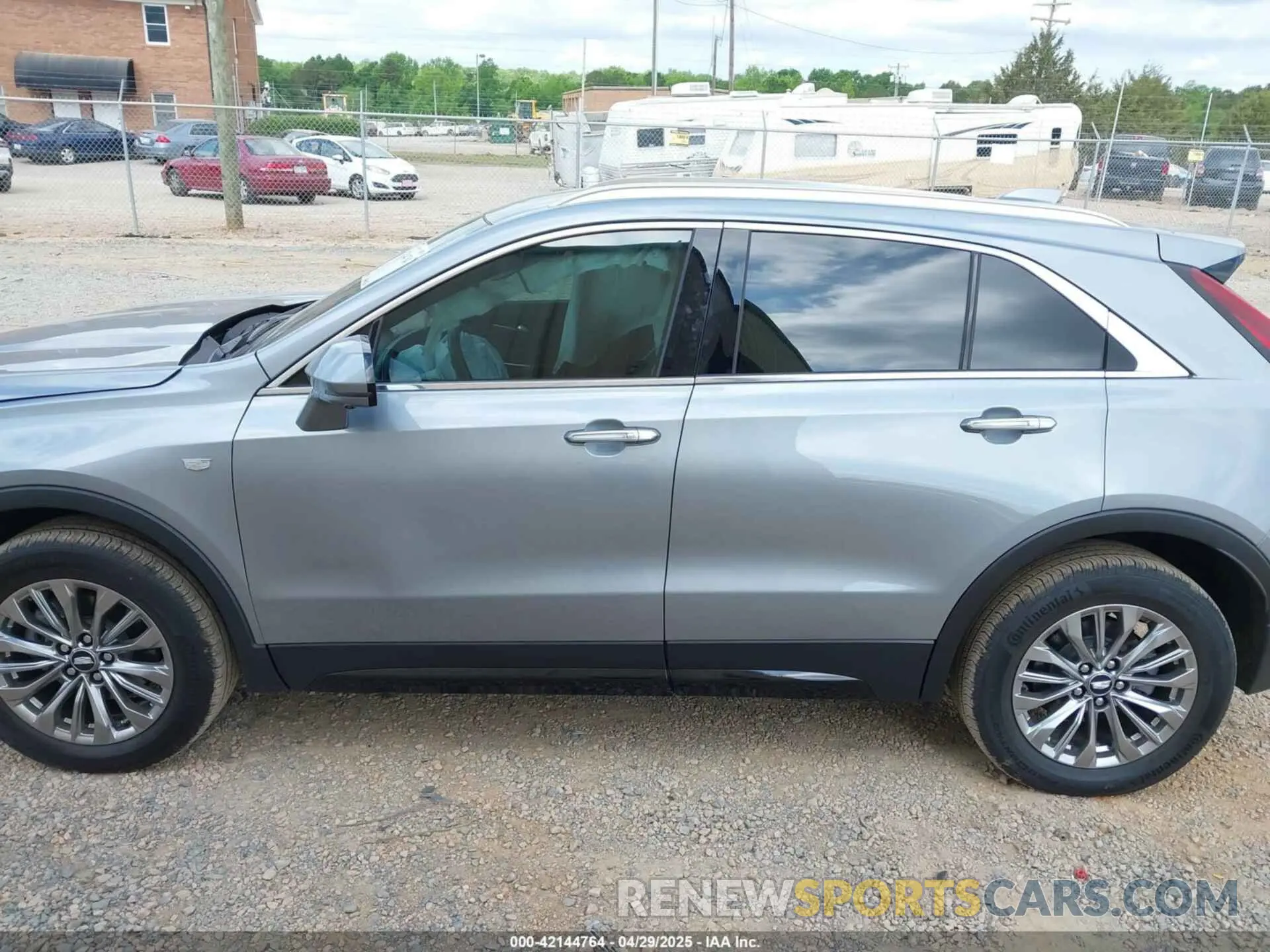 14 Photograph of a damaged car 1GYFZCR41SF142388 CADILLAC XT4 2025