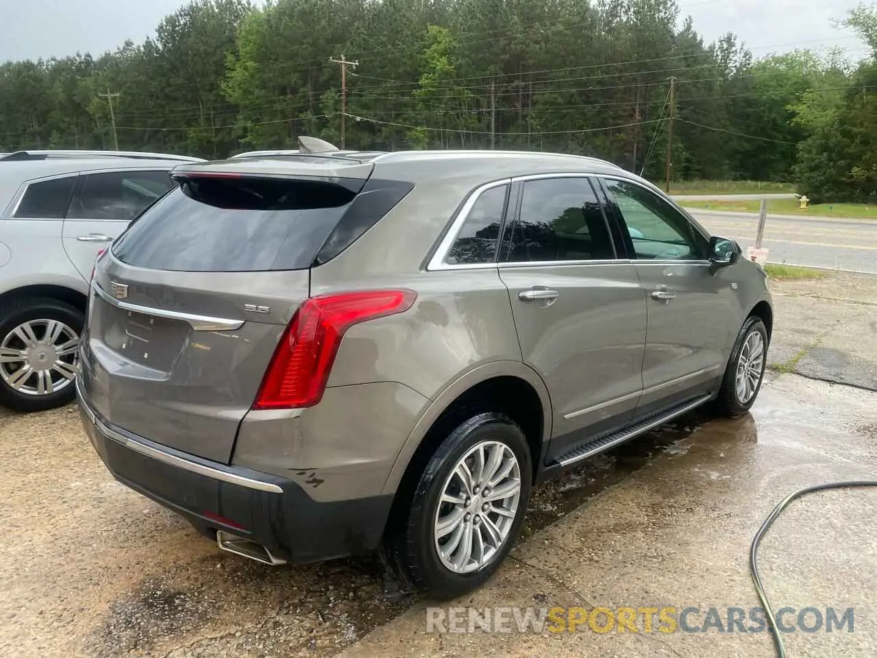 4 Photograph of a damaged car 1GYKNCRS0KZ206086 CADILLAC XT5 2019