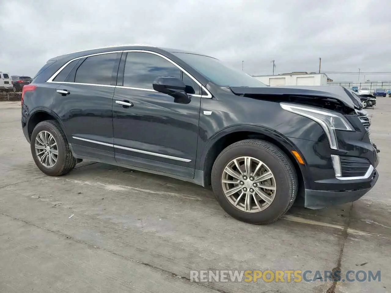 4 Photograph of a damaged car 1GYKNCRS1KZ271223 CADILLAC XT5 2019