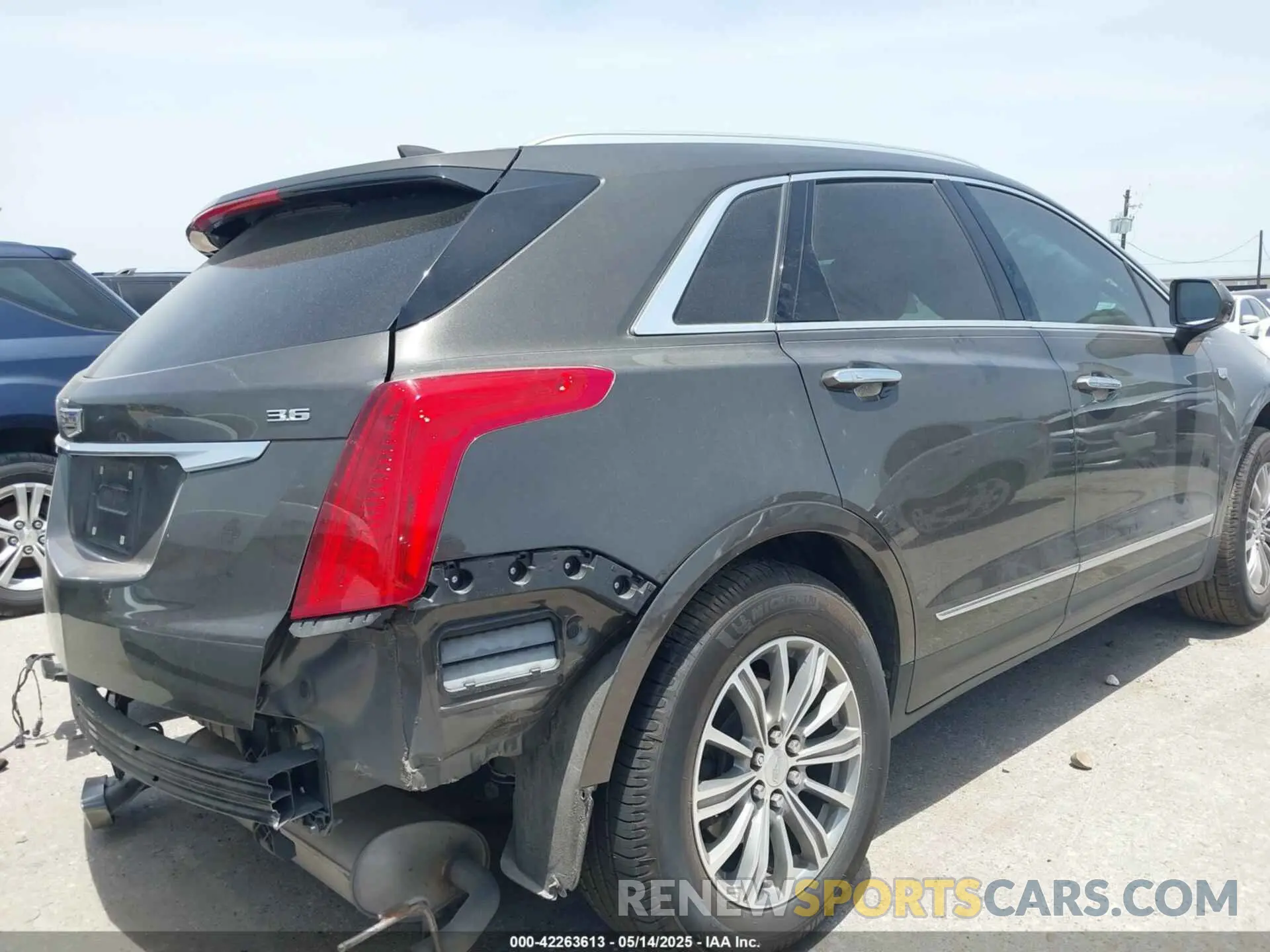 4 Photograph of a damaged car 1GYKNCRS2KZ210656 CADILLAC XT5 2019