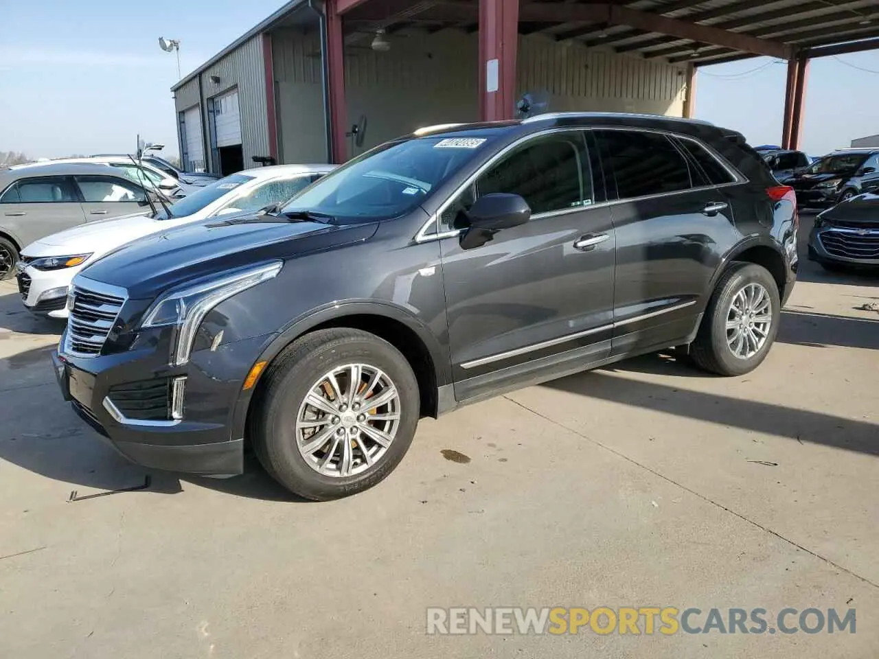 1 Photograph of a damaged car 1GYKNCRS2KZ289651 CADILLAC XT5 2019