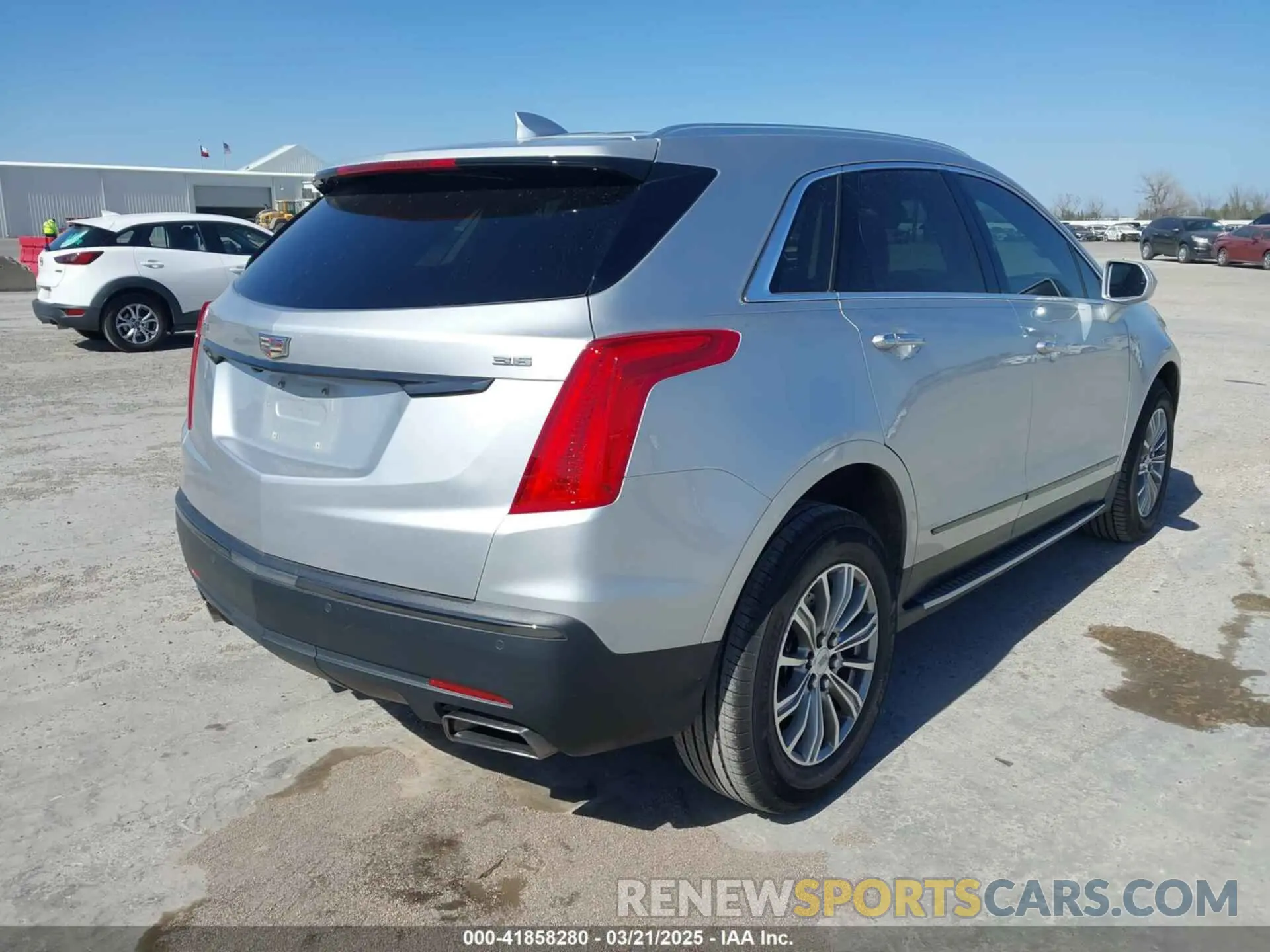 4 Photograph of a damaged car 1GYKNCRS3KZ100411 CADILLAC XT5 2019