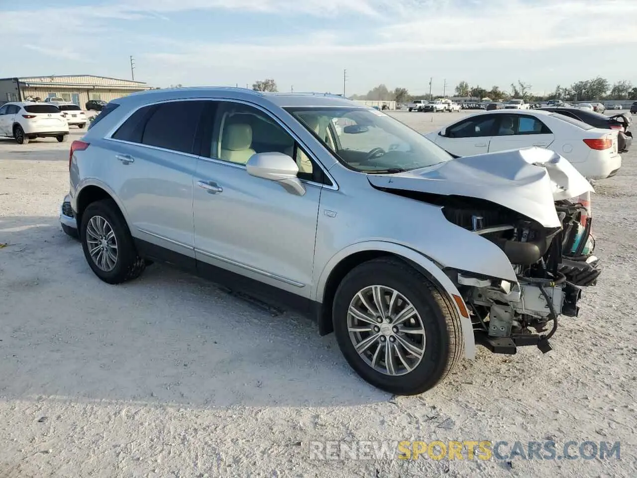 4 Photograph of a damaged car 1GYKNCRS5KZ203295 CADILLAC XT5 2019