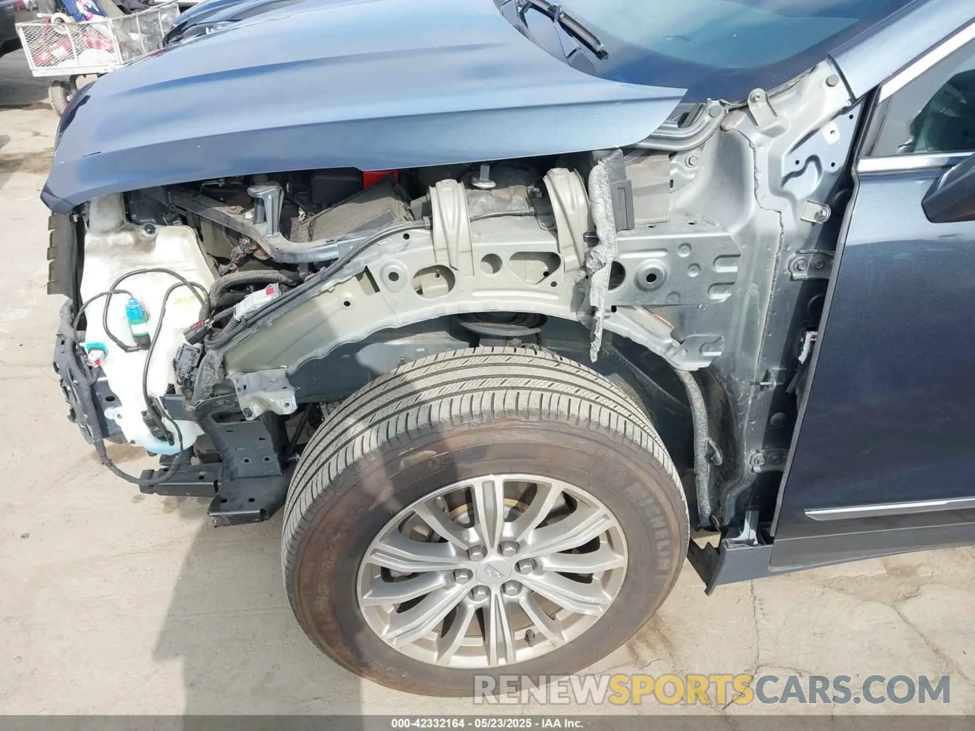 19 Photograph of a damaged car 1GYKNCRS6KZ251971 CADILLAC XT5 2019
