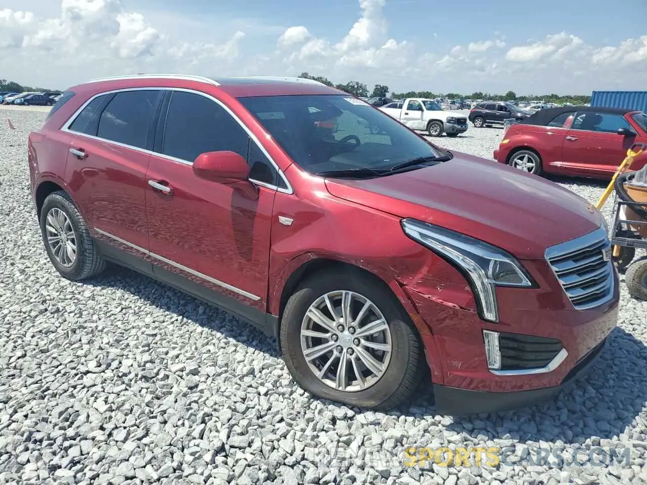 4 Photograph of a damaged car 1GYKNCRS7KZ246052 CADILLAC XT5 2019