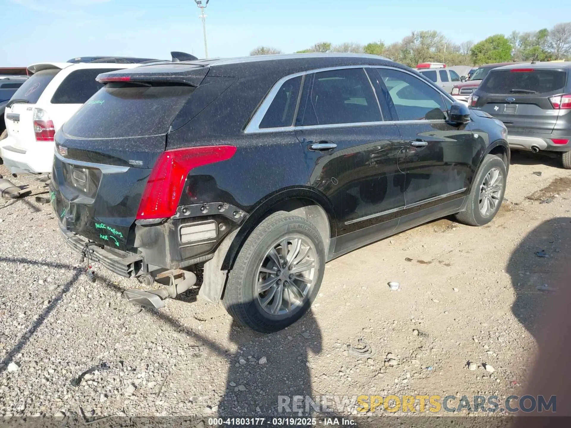 4 Photograph of a damaged car 1GYKNCRS8KZ174648 CADILLAC XT5 2019