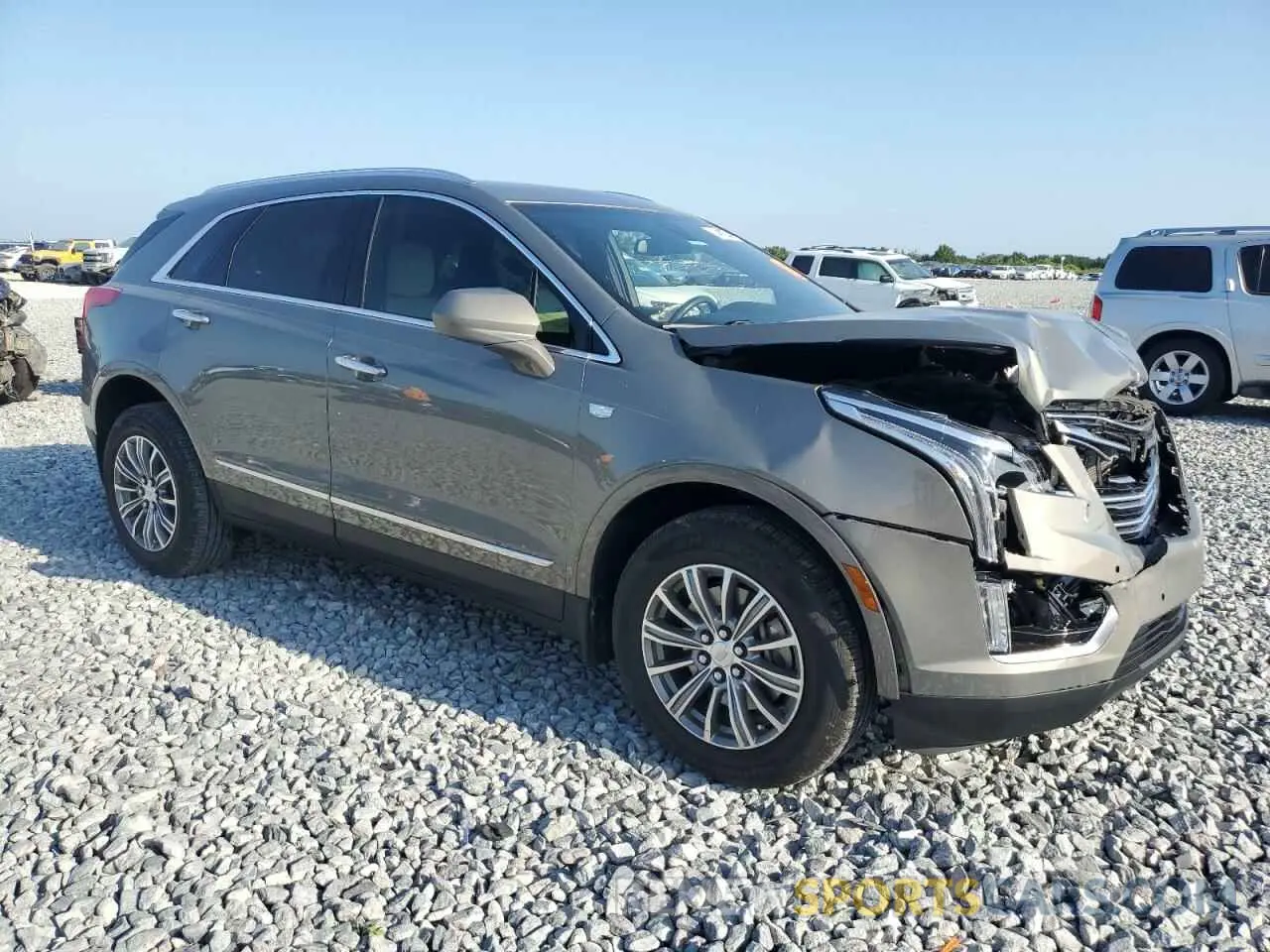4 Photograph of a damaged car 1GYKNCRS8KZ263958 CADILLAC XT5 2019