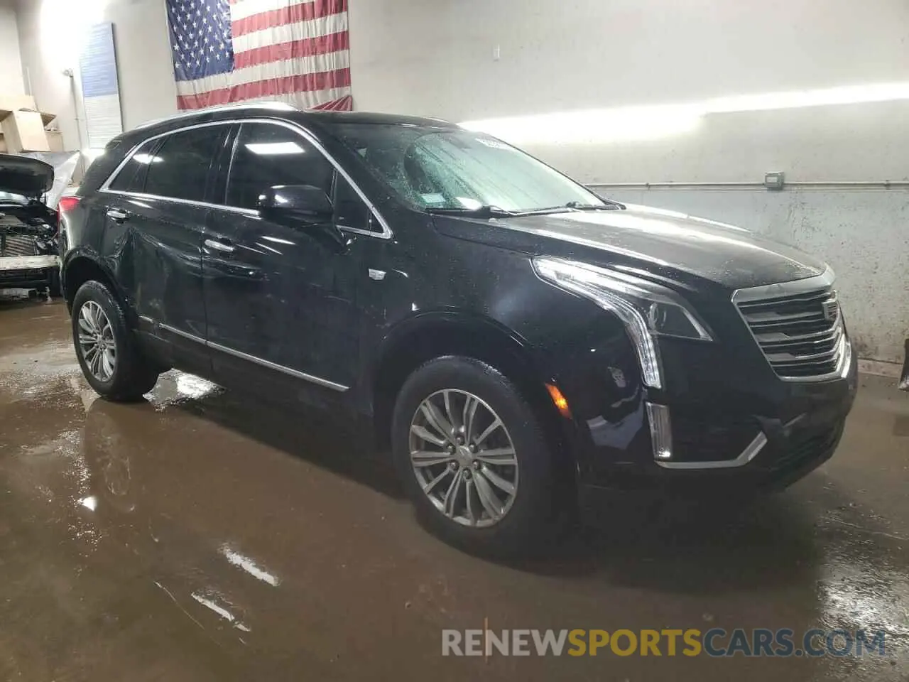 4 Photograph of a damaged car 1GYKNCRS9KZ162945 CADILLAC XT5 2019