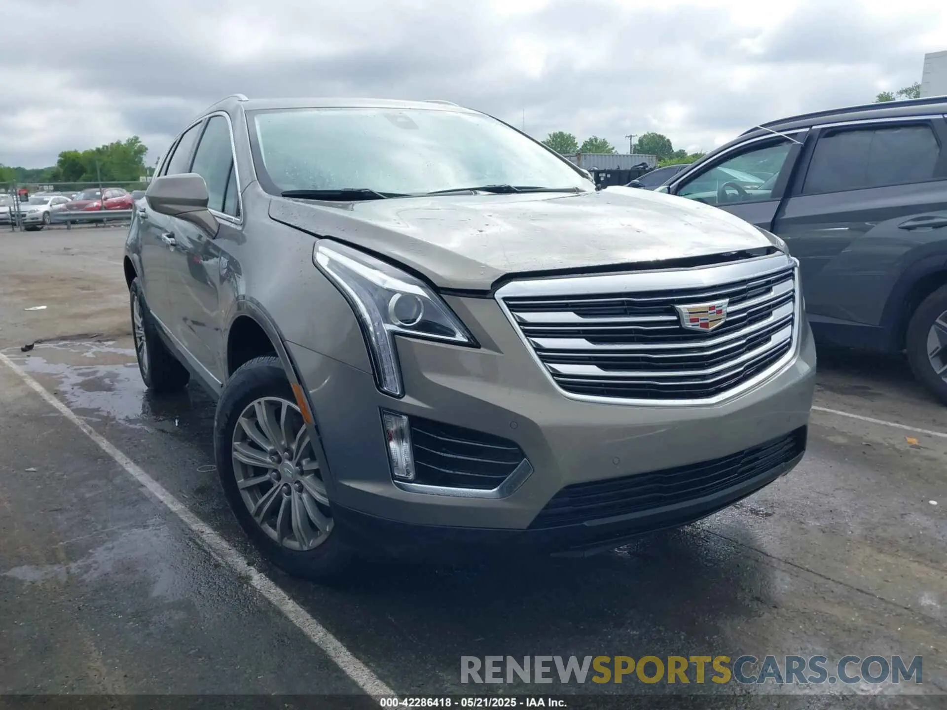 1 Photograph of a damaged car 1GYKNCRS9KZ198215 CADILLAC XT5 2019
