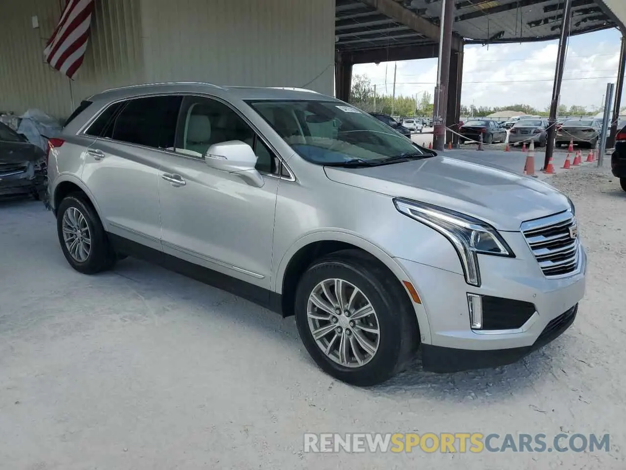 4 Photograph of a damaged car 1GYKNCRSXKZ167345 CADILLAC XT5 2019