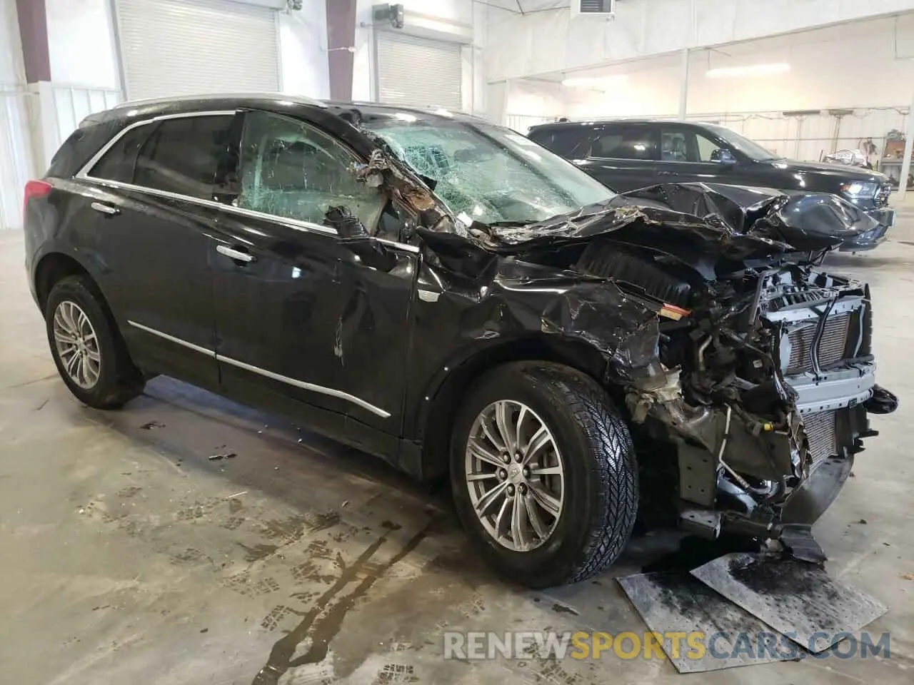 4 Photograph of a damaged car 1GYKNDRS5KZ299872 CADILLAC XT5 2019