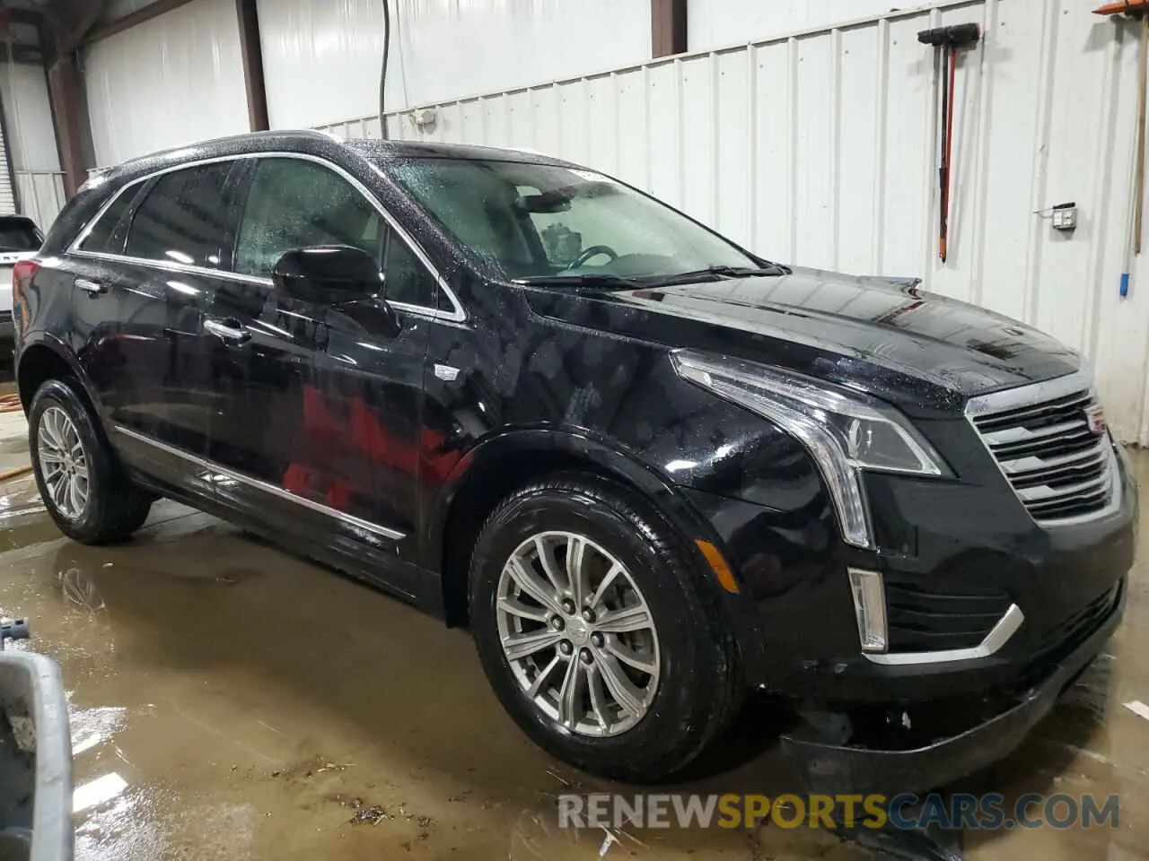 4 Photograph of a damaged car 1GYKNDRSXKZ163902 CADILLAC XT5 2019