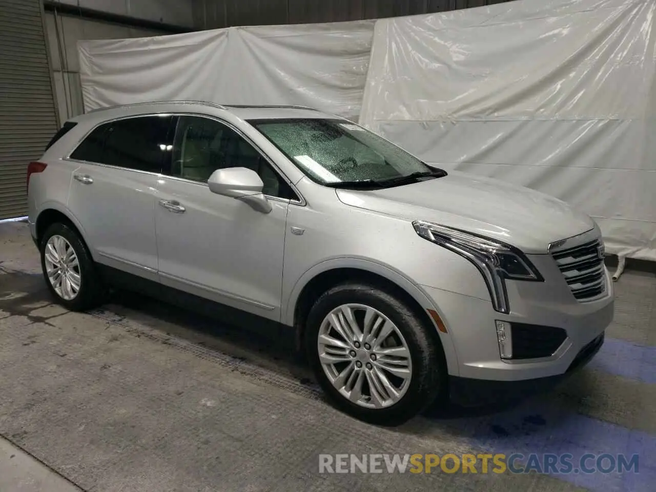 4 Photograph of a damaged car 1GYKNERS3KZ211522 CADILLAC XT5 2019