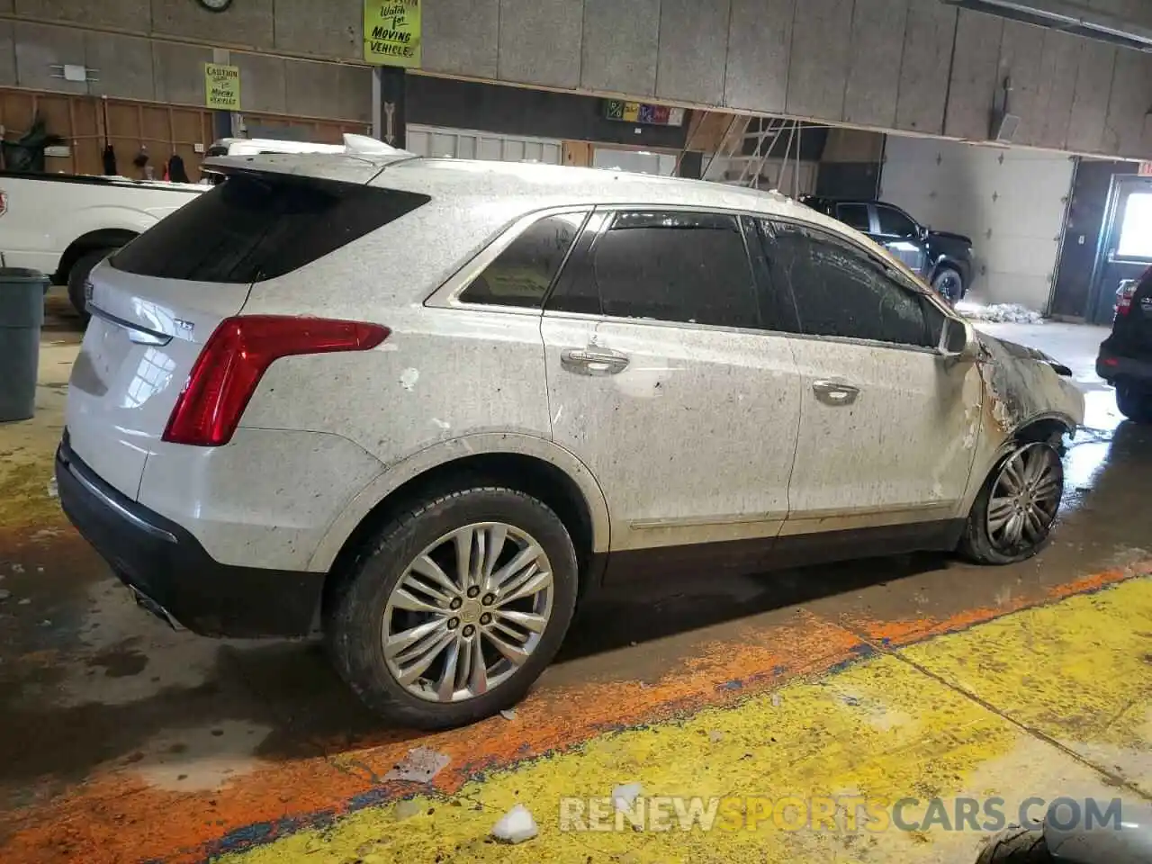 3 Photograph of a damaged car 1GYKNERS5KZ173811 CADILLAC XT5 2019