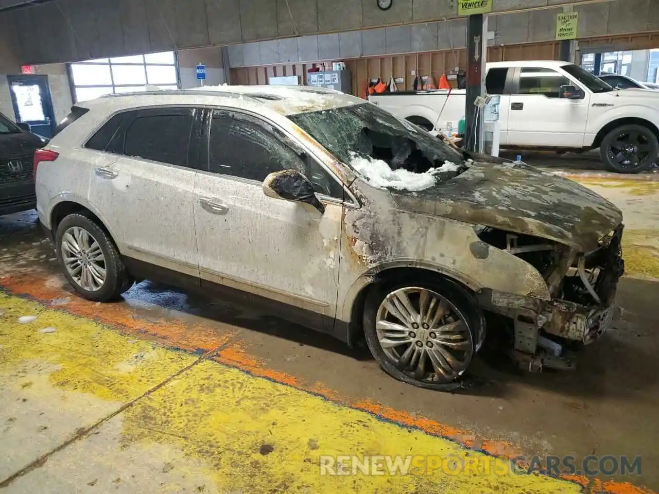 4 Photograph of a damaged car 1GYKNERS5KZ173811 CADILLAC XT5 2019