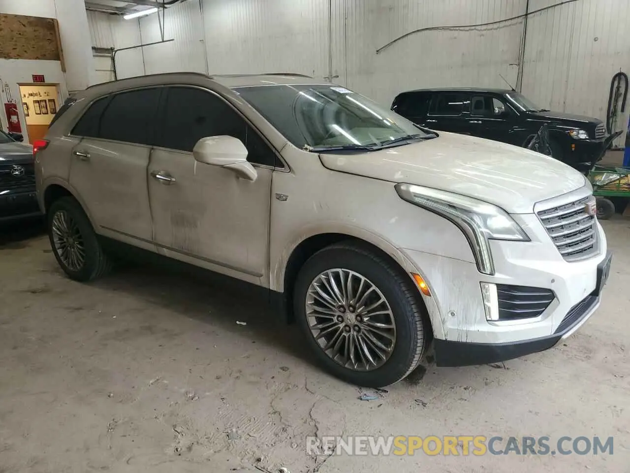 4 Photograph of a damaged car 1GYKNGRS6KZ236619 CADILLAC XT5 2019