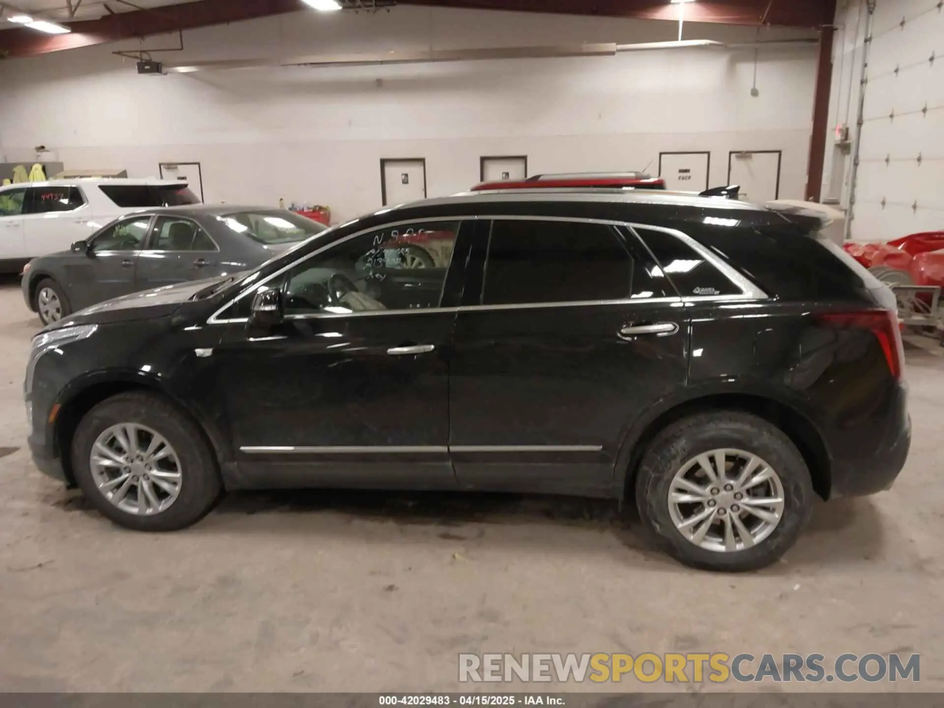 14 Photograph of a damaged car 1GYKNBR48MZ213902 CADILLAC XT5 2021