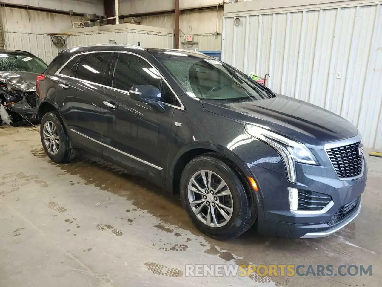 4 Photograph of a damaged car 1GYKNCRS8MZ136937 CADILLAC XT5 2021