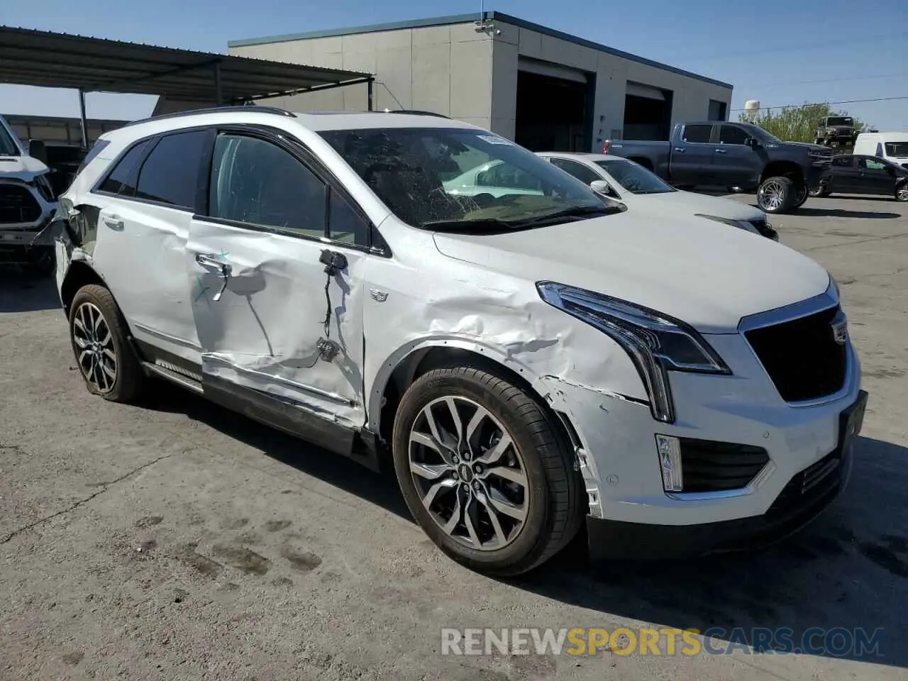 4 Photograph of a damaged car 1GYKNHRS2MZ156923 CADILLAC XT5 2021