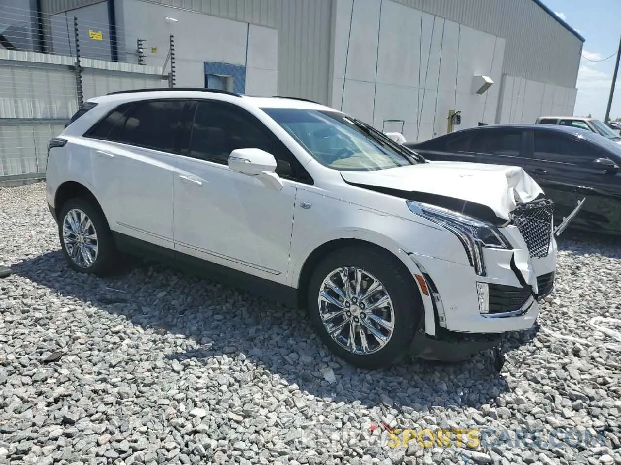 4 Photograph of a damaged car 1GYKNHRS3MZ203120 CADILLAC XT5 2021