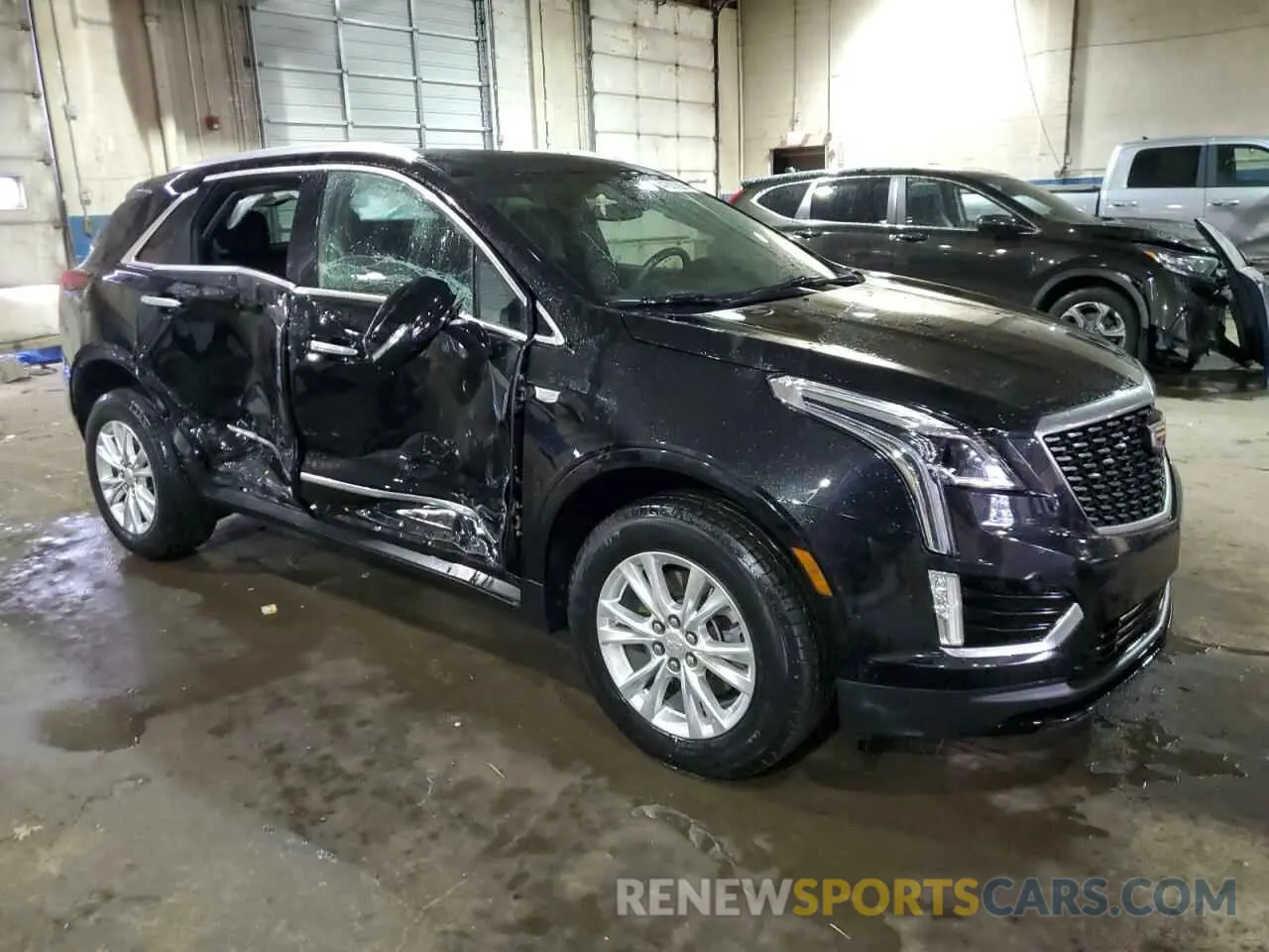 4 Photograph of a damaged car 1GYKNBR46NZ173918 CADILLAC XT5 2022
