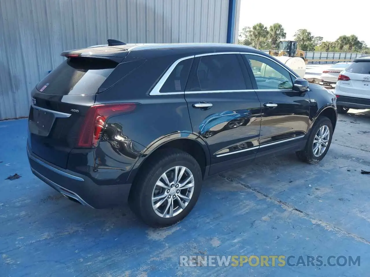3 Photograph of a damaged car 1GYKNCRS7NZ104983 CADILLAC XT5 2022