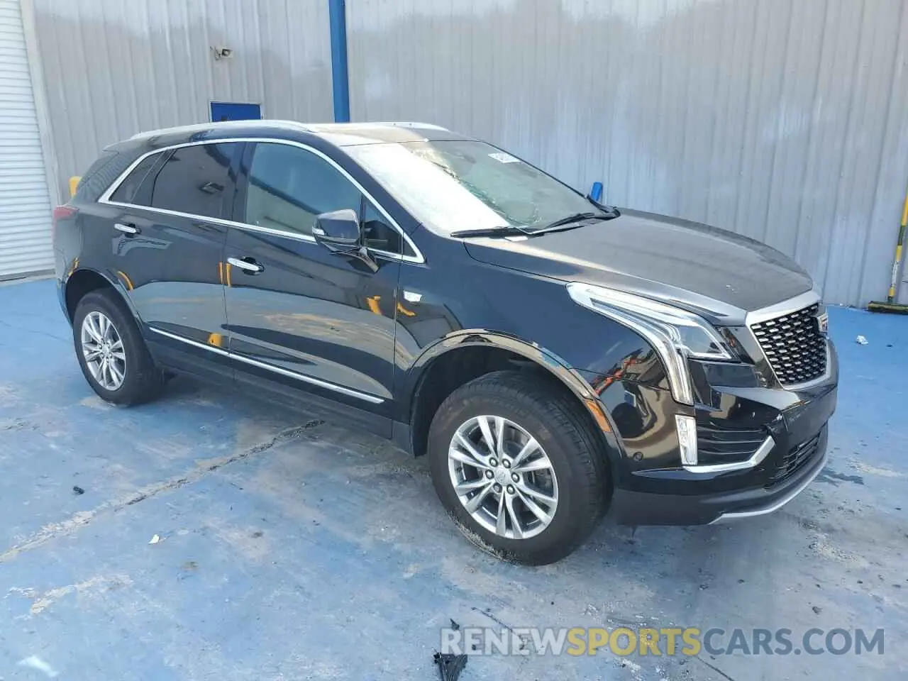 4 Photograph of a damaged car 1GYKNCRS7NZ104983 CADILLAC XT5 2022