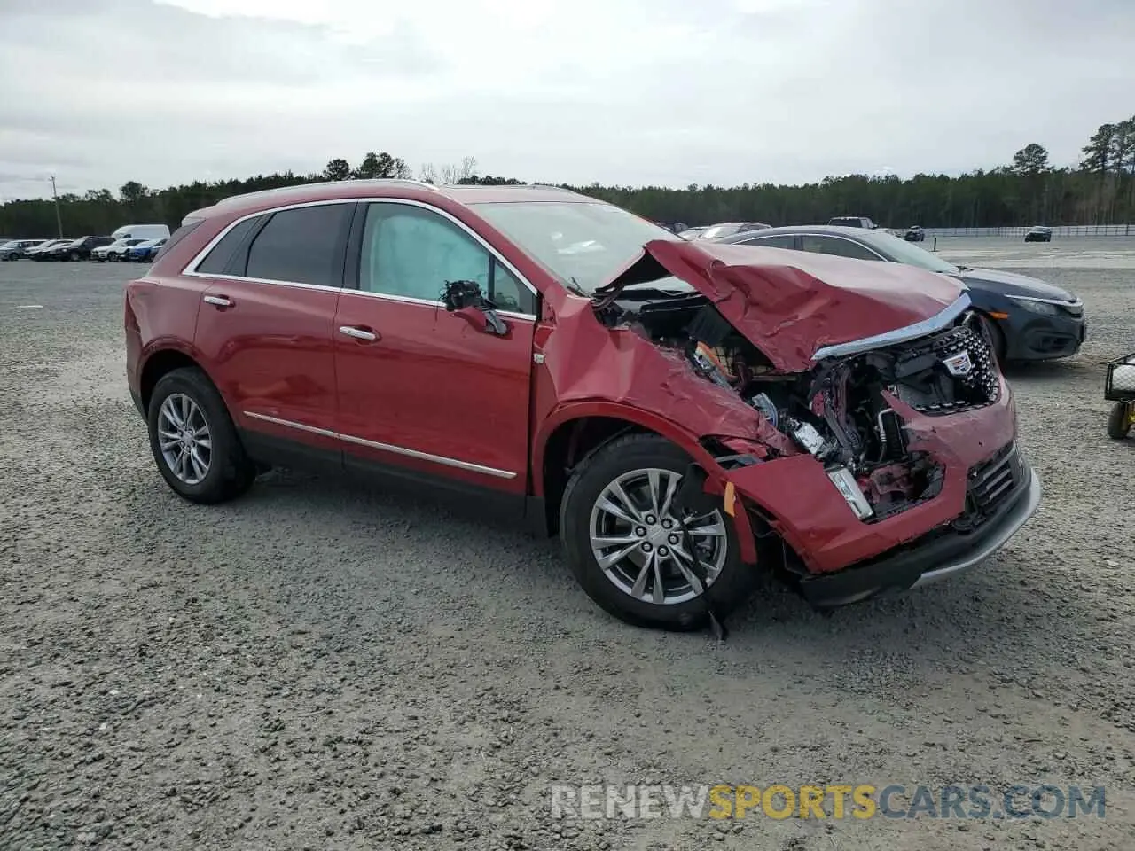 4 Photograph of a damaged car 1GYKNCRS9NZ130520 CADILLAC XT5 2022